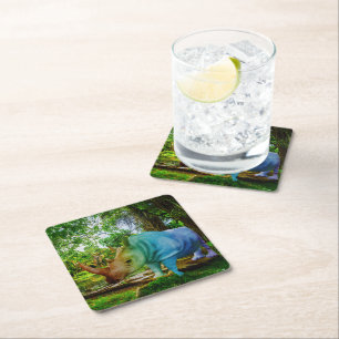 SlipperyJoe's rhinoceros lush tropical setting pri Square Paper Coaster