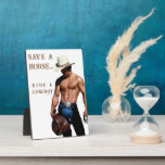 SlipperyJoe's save horse ride straw cowboy hat mus Plaque<br><div class="desc">SlipperyJoe's save horse ride straw cowboy hat muscular man shirtless torso holding saddle well-defined physique chiseled six-pack hat chaps saddle black belt silver buckle rancher life muscles rippling wild ride ahead bold rugged western vibe artistic gay pride gifts LGBTQIA yeehaw blue jeans</div>