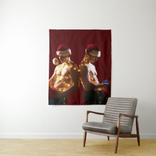 SlipperyJoe's shirtless men back-to-back Christmas Tapestry