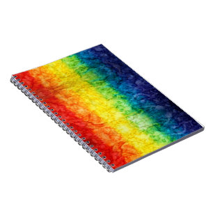 SlipperyJoe's tie-dyed flag rainbow pressed into s Notebook