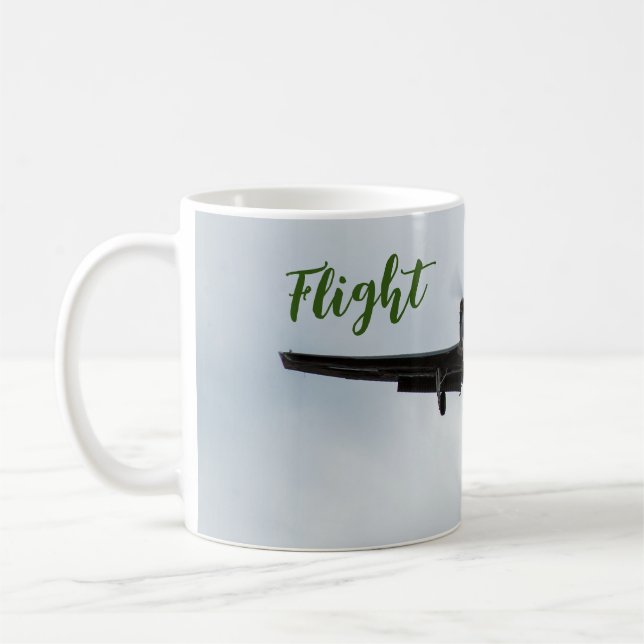 Small aircraft with flight time in green coffee mug (Left)