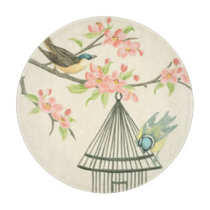 Small Birds Perched on a Branch and on a Birdcage Cutting Board