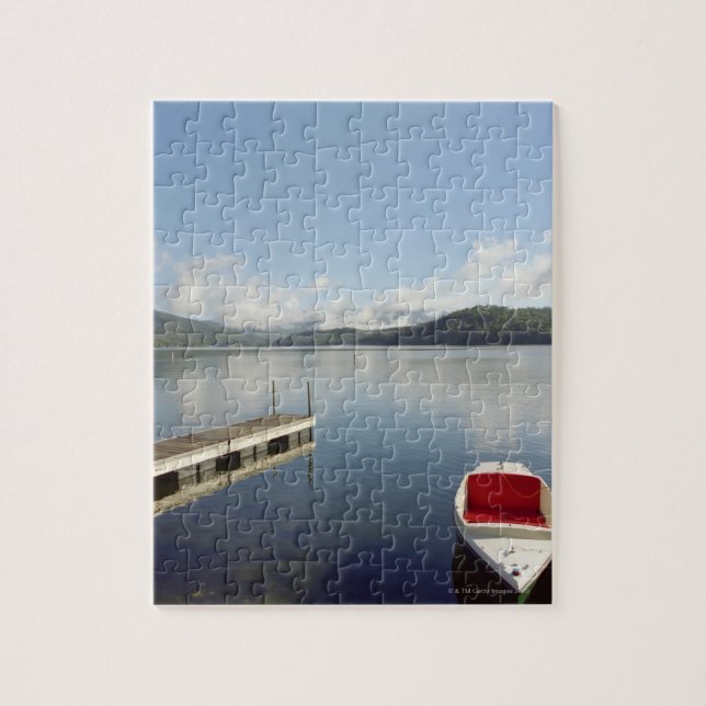 Small boat tied up on dock at Lake Placid Jigsaw Puzzle (Vertical)