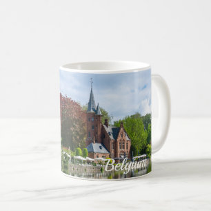 Small castle near lake in Bruges, Belgium Coffee Mug