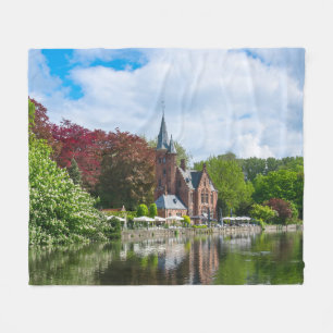 Small castle near lake in Bruges, Belgium Fleece Blanket