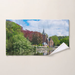 Small castle near lake in Bruges, Belgium Hand Towel