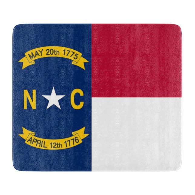 Small glass cutting board with North Carolina flag (Front)