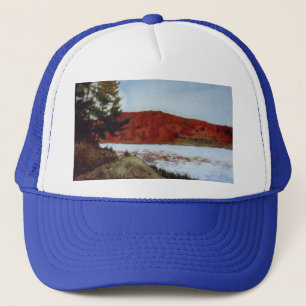 Small lake with fall trees and windy waters trucker hat