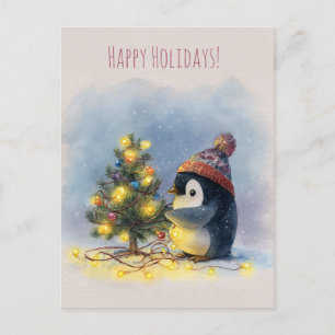 Small penguin decorates tiny Christmas tree, Holiday Postcard