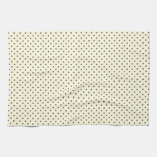 Small purple polka dots on cream tea towel