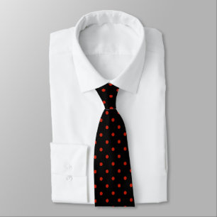 Small red polka dot pattern on black tie