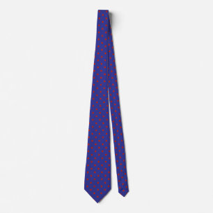 Small red polka dot pattern on blue tie