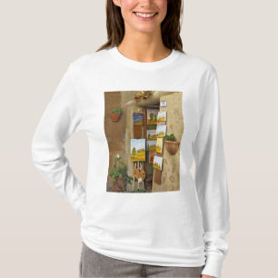 Small shope with artwork for sale on sidewalk T-Shirt