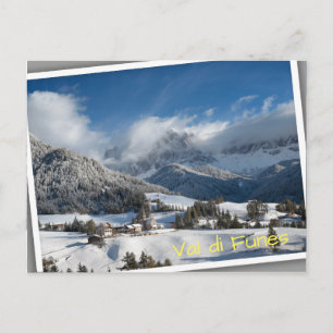 Small village with Dolomites mountains in the snow Postcard