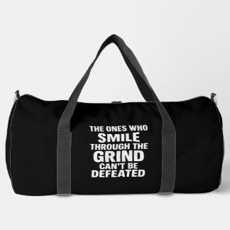 Smile grind gym motivation quote with white text duffle bag