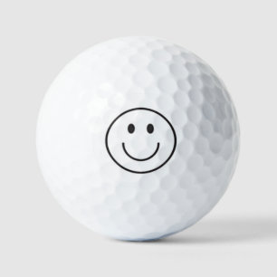 Smiling golf ball