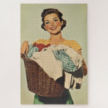 Smiling Housewife with Laundry Basket Jigsaw Puzzle<br><div class="desc">A cheerful,  vintage-style illustration of a woman holding a laundry basket filled with clothes. Her radiant smile,  bright makeup,  and neatly styled hair evoke the aesthetics of mid-20th century advertising,  often associated with domestic bliss and homemaking.</div>