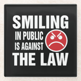 Smiling in Public is Against the Law Glass Coaster