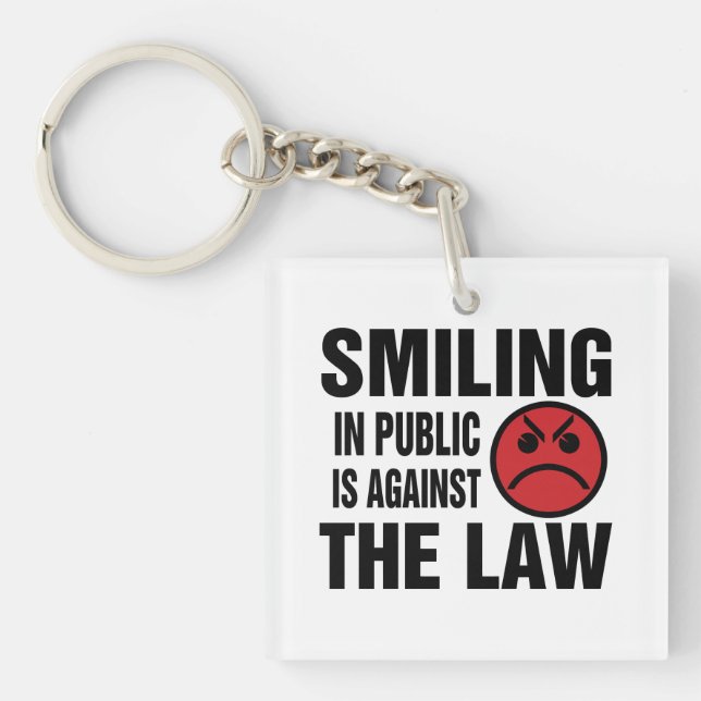 Smiling in Public is Against the Law Key Ring (Front)