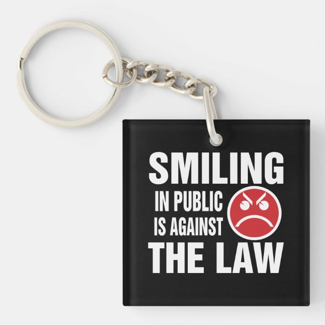 Smiling in Public is Against the Law Key Ring (Front)