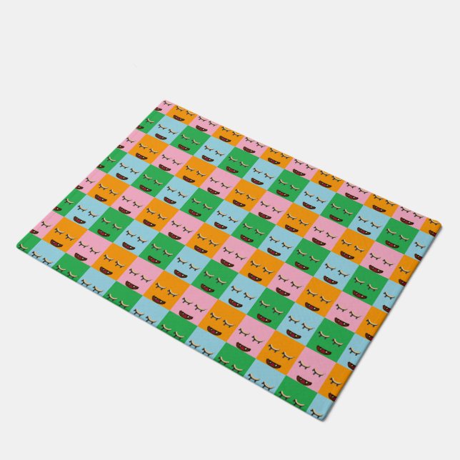 Smiling monster block faces doormat (Angled)
