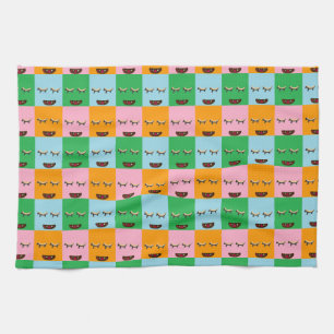 Smiling monster block faces tea towel