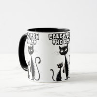 Sneaky Smiles: Black Kitten with a Smiling Compani