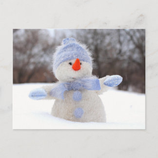 Sneeuwpop met blauwe muts postcard
