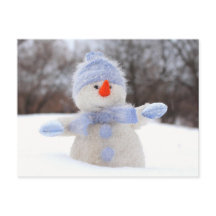 Sneeuwpop met blauwe muts