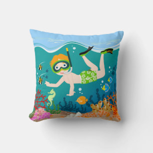 Snorkelling boy under the sea cushion