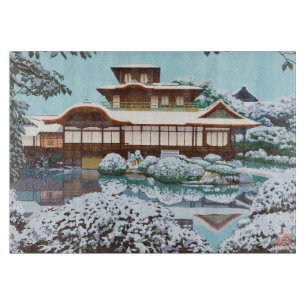 Snow At Hiunkaku Temple japanese winter scenery Cutting Board