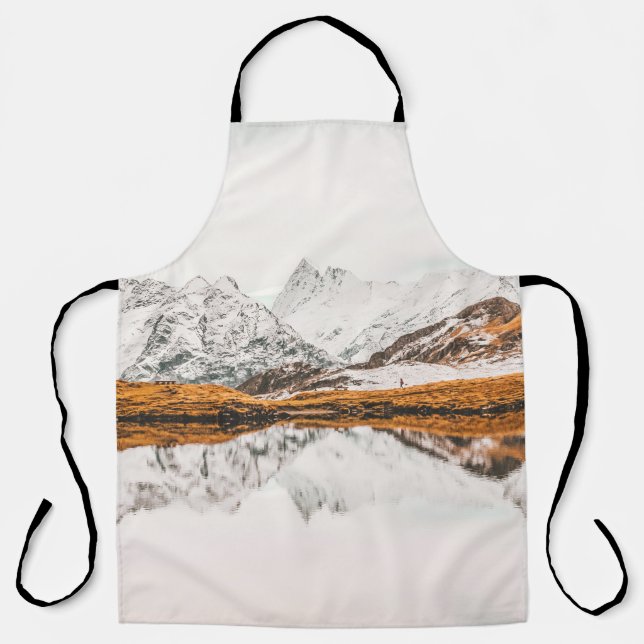 SNOW-CAPPED ROCKY MOUNTAIN UNDER CLOUDY SKY DURING APRON (Front)