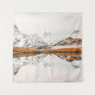 SNOW-CAPPED ROCKY MOUNTAIN UNDER CLOUDY SKY DURING TAPESTRY