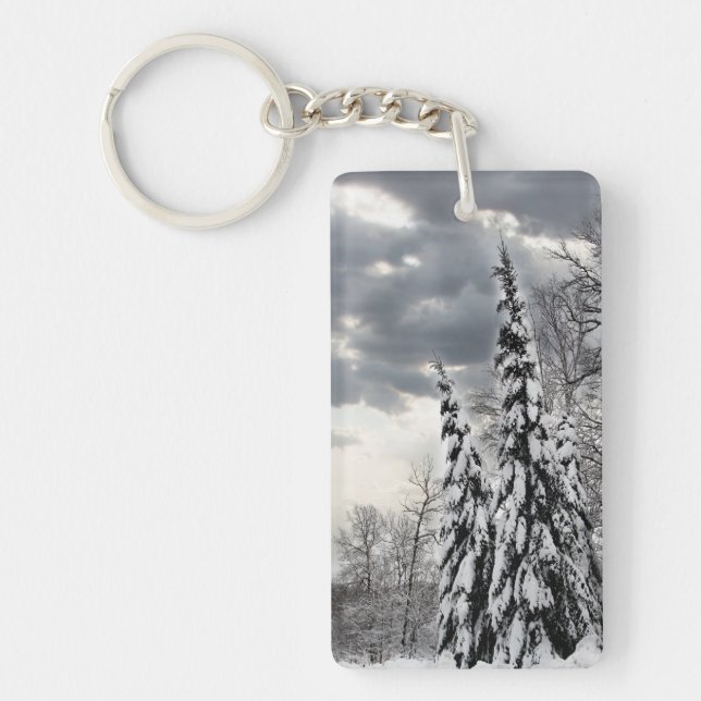Snow-Covered Evergreen Trees Under Dramatic Winter Key Ring (Front)