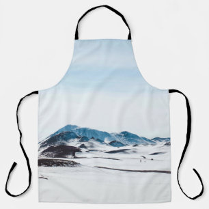 SNOW-COVERED LAND DURING DAY TIME APRON