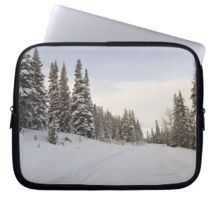 Snow-covered landscape laptop sleeve