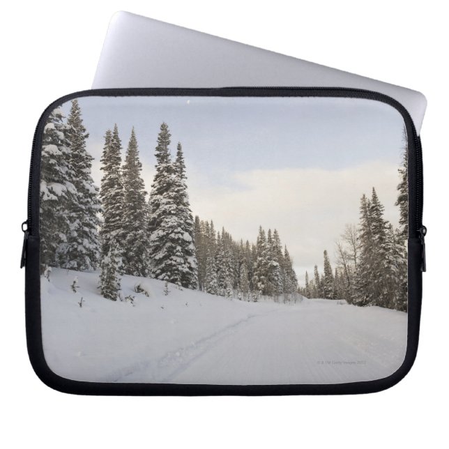 Snow-covered landscape laptop sleeve (Front)