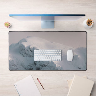 Snow covered mountain desk mat