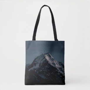 SNOW COVERED MOUNTAIN DURING NIGHTTIME TOTE BAG
