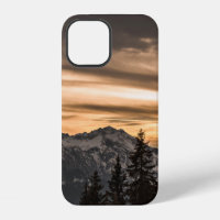 SNOW COVERED MOUNTAIN DURING SUNSET