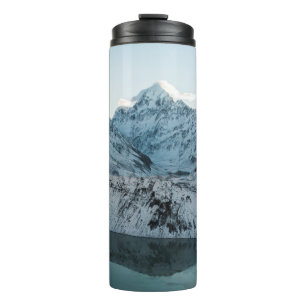 SNOW COVERED MOUNTAIN NEAR BODY OF WATER THERMAL TUMBLER