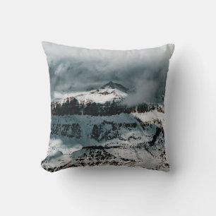 SNOW COVERED MOUNTAIN UNDER CLOUDY SKY DURING DAYT CUSHION