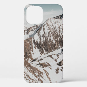 SNOW COVERED MOUNTAIN UNDER WHITE CLOUDS DURING DA iPhone 12 CASE