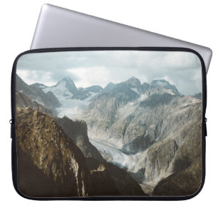SNOW COVERED MOUNTAINS DURING DAYTIME LAPTOP SLEEVE