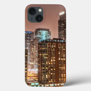 Snow falls over skyline at evening in Chicago iPhone 13 Case