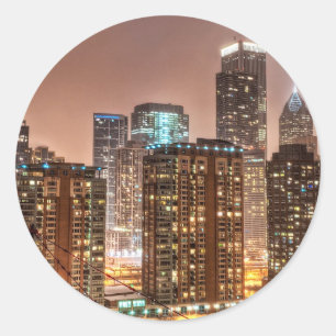Snow falls over skyline at evening in Chicago Classic Round Sticker
