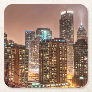 Snow falls over skyline at evening in Chicago Square Paper Coaster