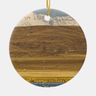 Snow geese during spring migration ceramic tree decoration