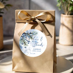 Snow in love winter bridal shower favours classic round sticker<br><div class="desc">Snow in love winter bridal shower favours stickers personalised thank you stickers template,  watercolor dusty blue winter berries on snowy pine branches snowflakes personalised favour stickers,  winter bridal shower personalised  favour stickers customised stickers,  winter bridal shower party supplies,  bridal shower favours</div>