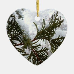 Snow on Evergreen Branches Ceramic Ornament